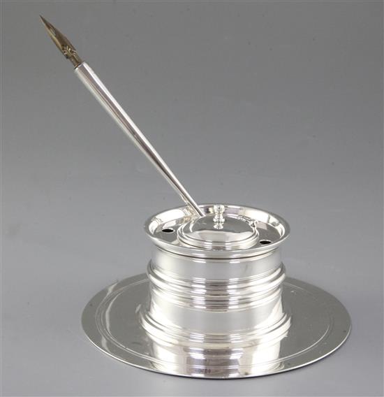 A Victorian silver capstan inkwell, by Edward Barnard & Sons Ltd, Diameter 153mm, weight 10oz/314grms.